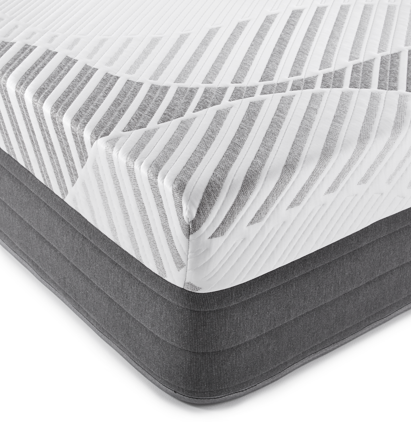 Sopor 14" Luxury Hybrid Mattress close up of the corner, dark padded side stich, Top white fabric wraps over the side connecting to the darker bottom side fabric. Large dark grey welt on the bottom of the mattress.