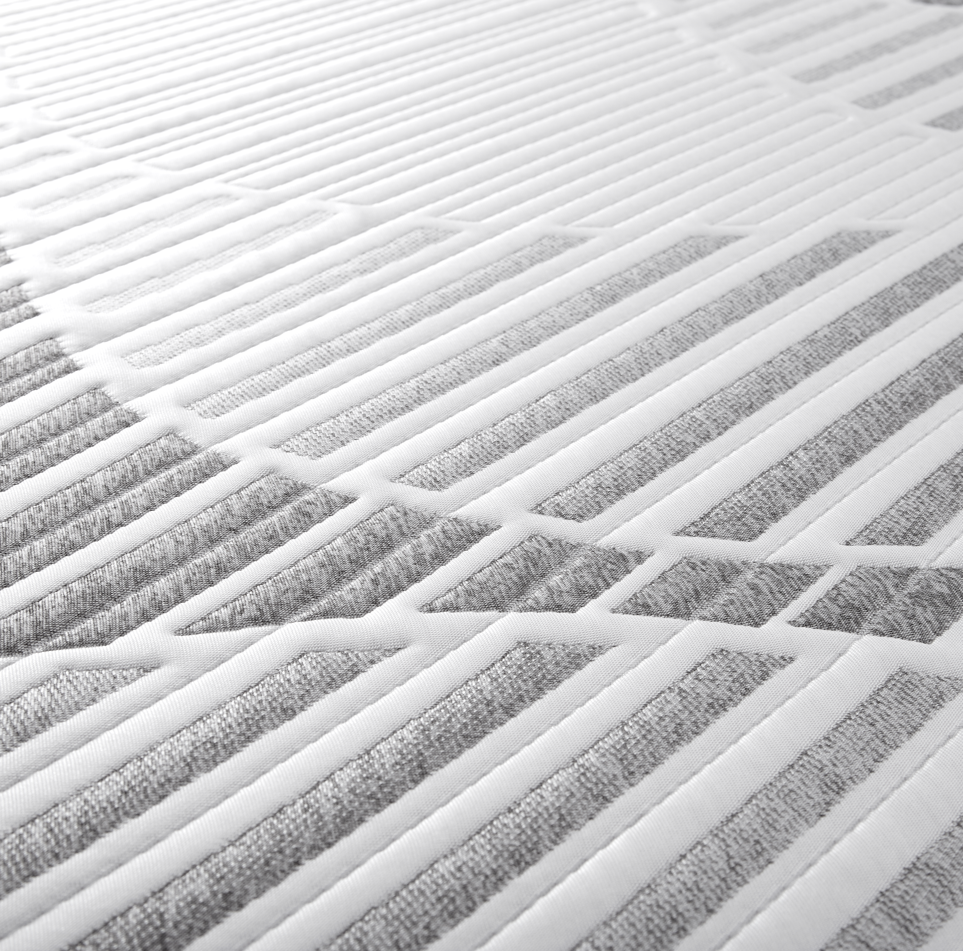 Sopor 14" Luxury Hybrid Mattress close up angle of top fabric showing off the white and grey pattern. Modern style in tight alternating pattern. 